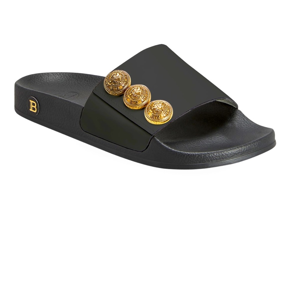 Balmain "Symi" leather sandals with golden button trim.